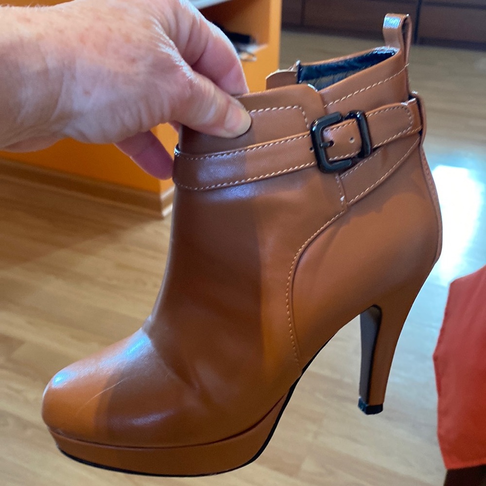 Size 4 high heel bootie.  Like new.